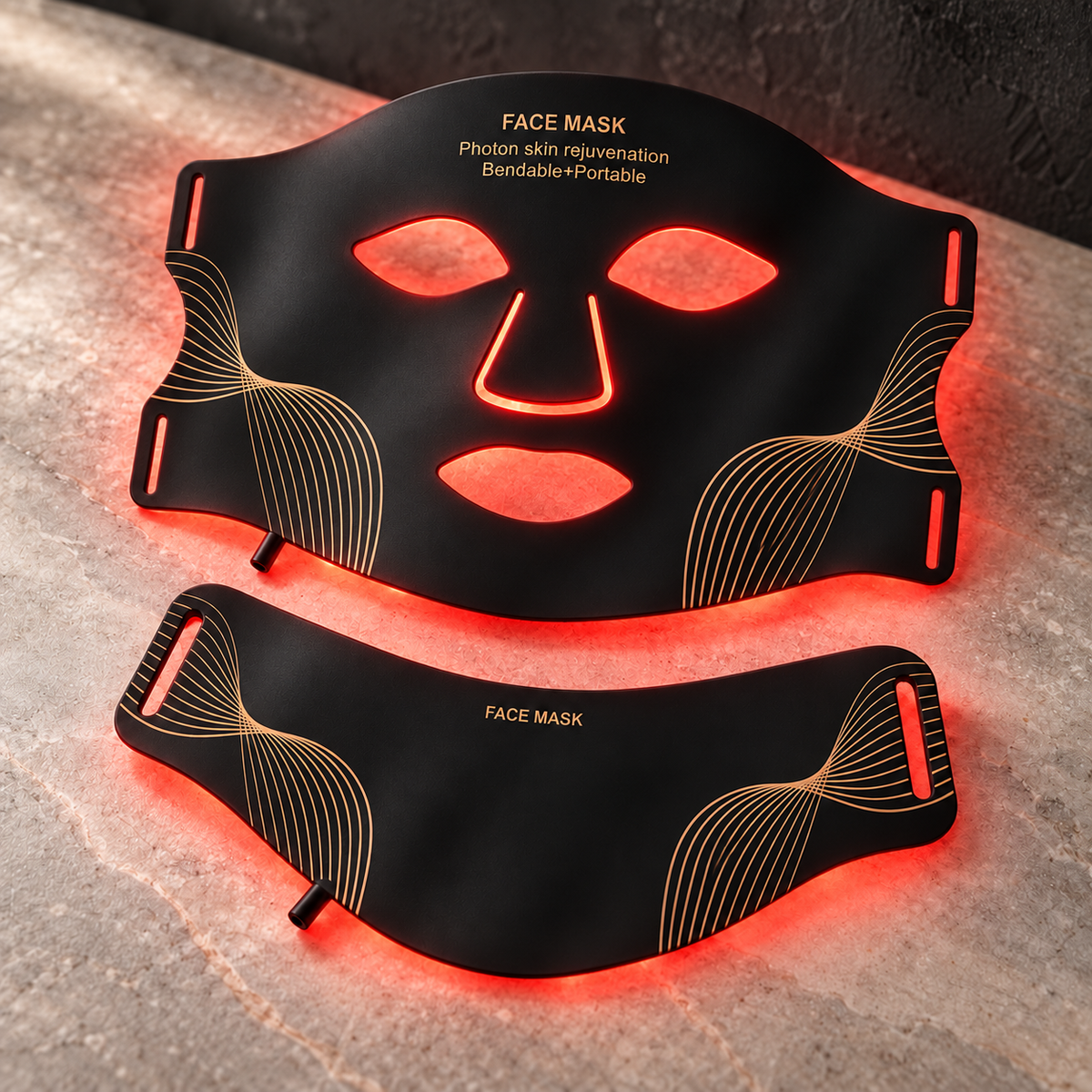 Style 1 flexible black and gold face-and-neck mask set with red light shining from the inner surfaces.
